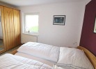 EG: 1 Schlafzimmer mit Doppelbett